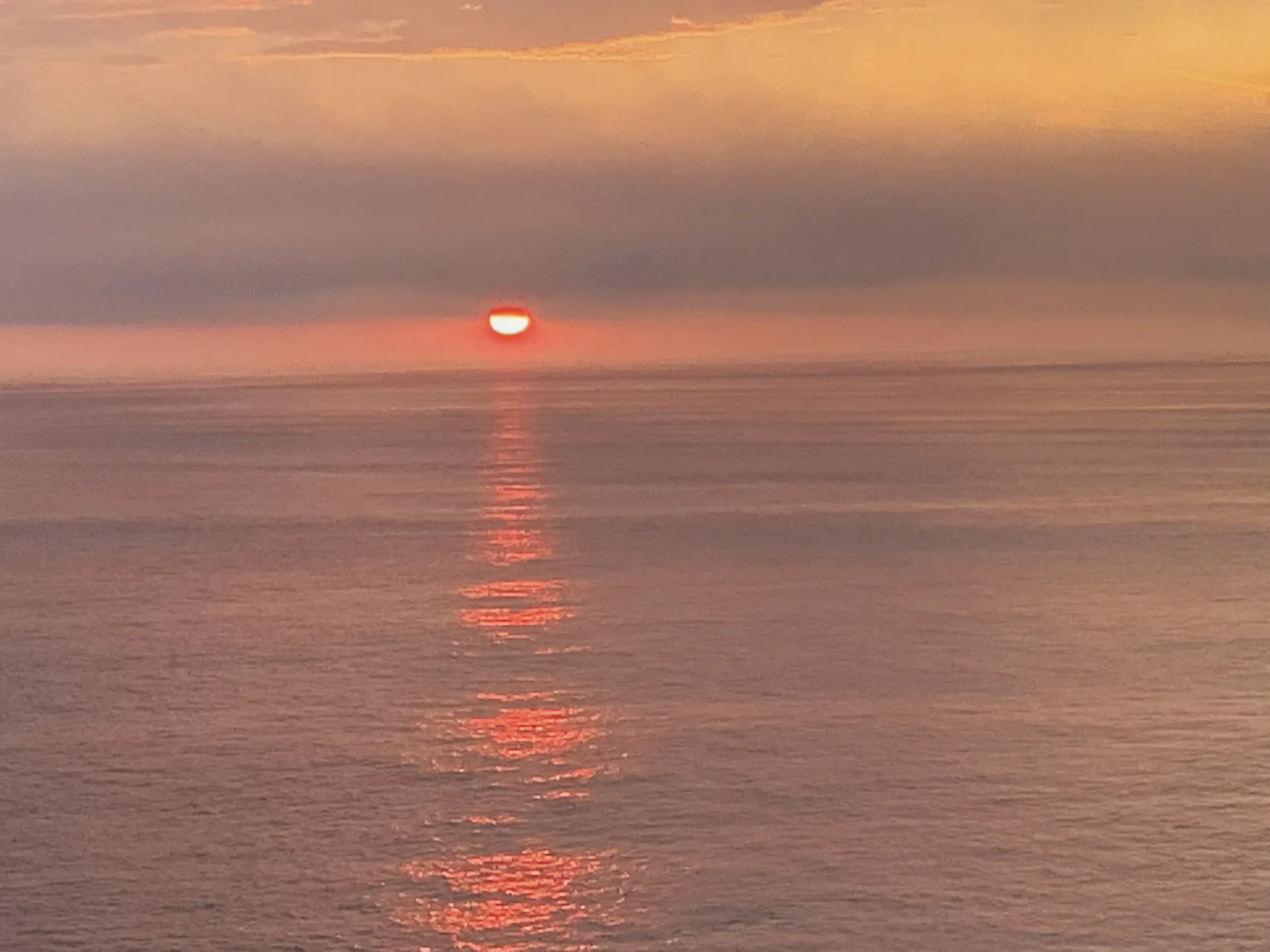 beautiful yellow-orange sunset at sea 